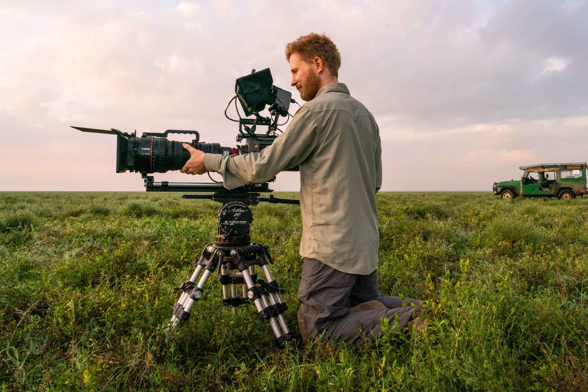 Filmmaker pre-focusing on a mark in the scene before the subject enters