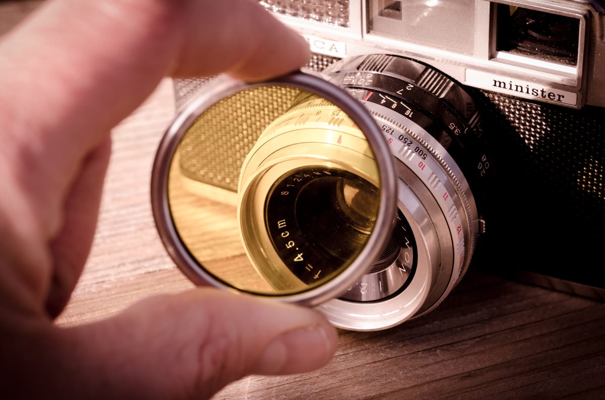 ND filter attached to a cinema camera lens for outdoor filming