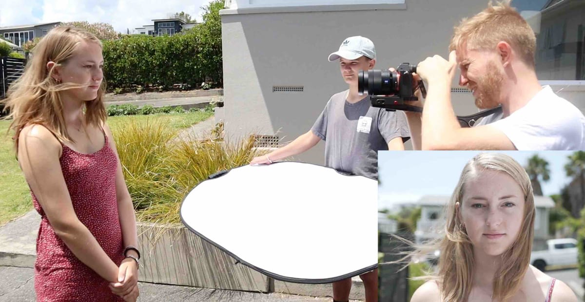 Using a reflector to bounce natural light onto a documentary subject