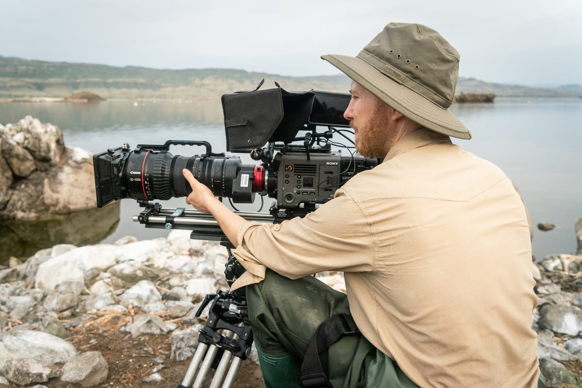 Observational documentary filmmaking with camera capturing real events