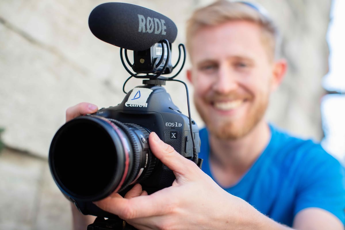 Documentary camera with autofocus tracking a subject