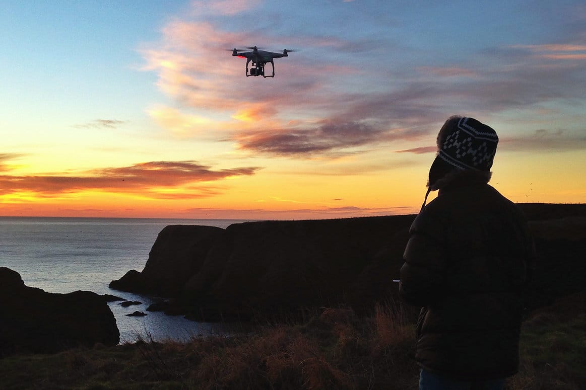 Sebastian Solberg filming with a drone for aerial documentary shots
