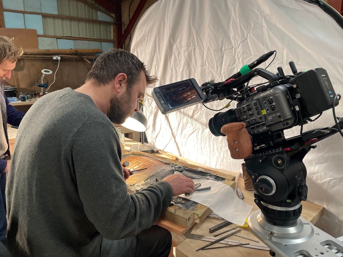 Documentary filmmaker choosing camera gear for a shoot