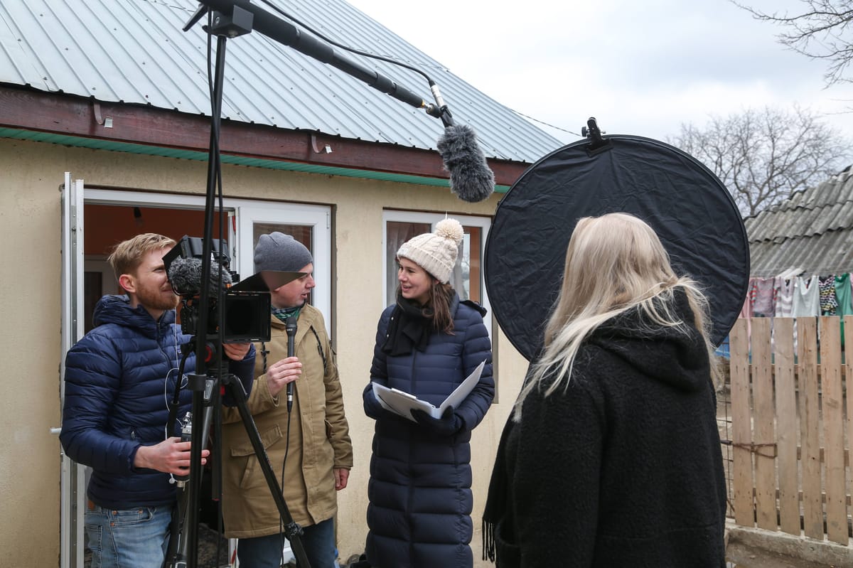 Documentary filmmaker working with vulnerable community members on location