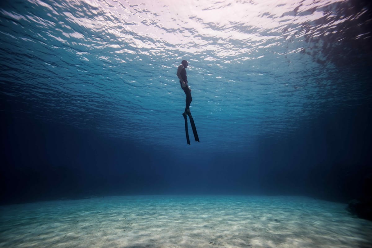 Christina freediving in Roatan