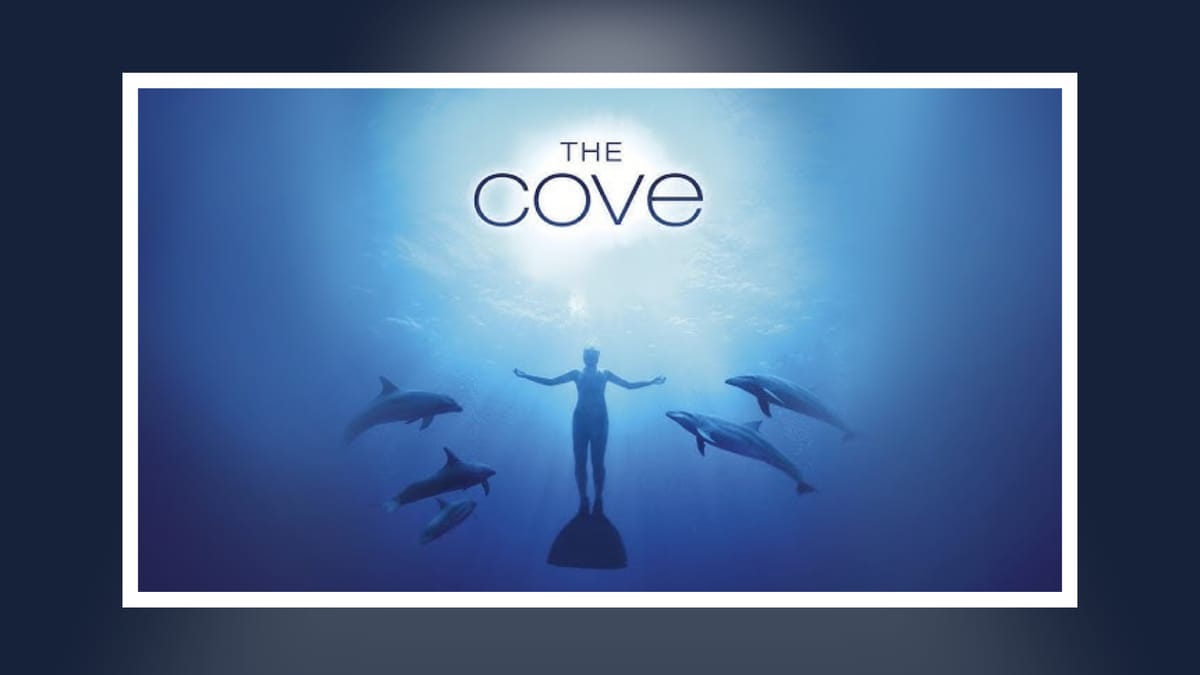 The Cove documentary poster featuring dolphins and underwater scene