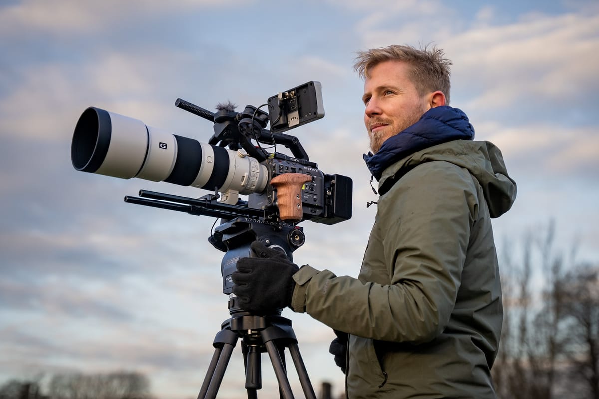 Beginner filmmaker learning to use a documentary camera