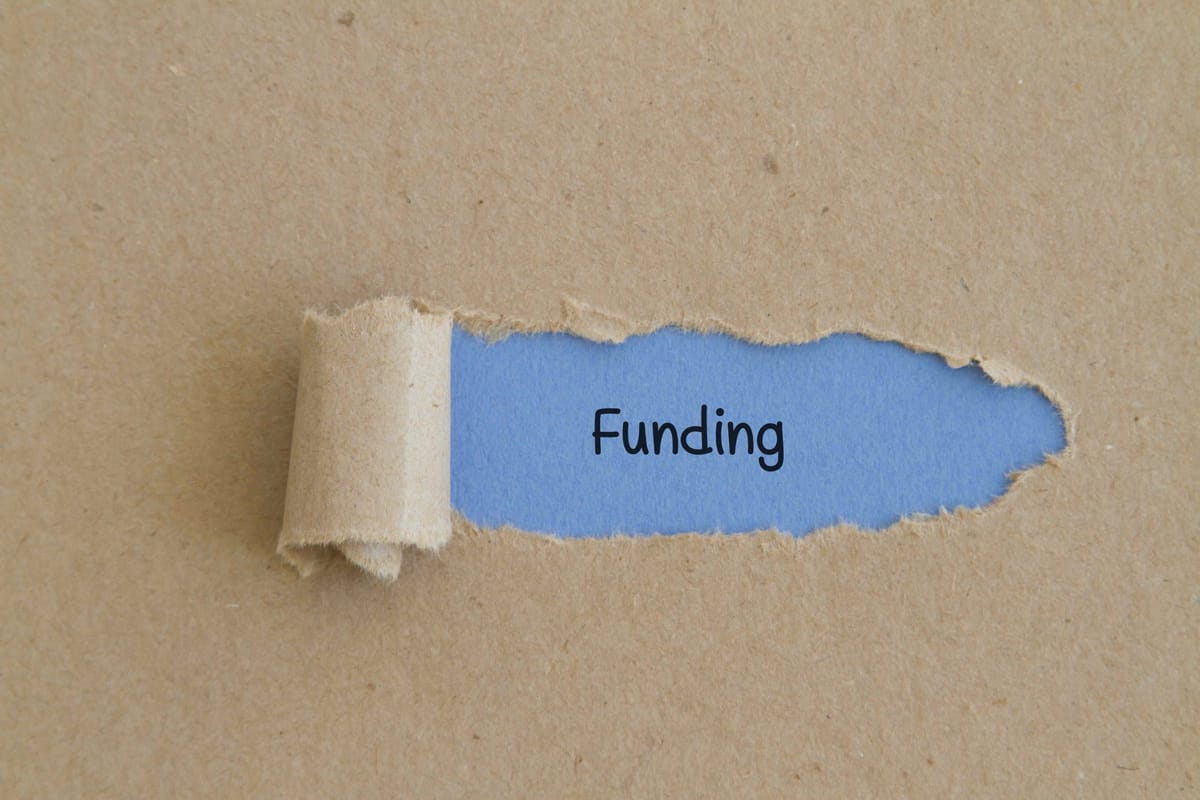 Successful documentary filmmaker reviewing funding options for their next project