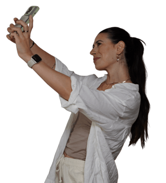 Gianna Cestone filming a selfie video on her phone