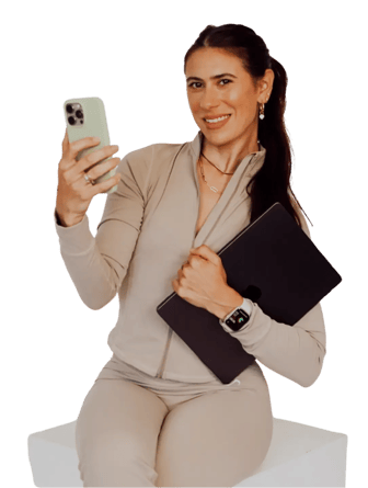 Gianna Cestone holding a phone and a tablet
