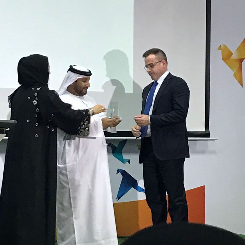 Christopher Velis receiving recognition from UAE Ministry of Health at Dubai Innovation Week