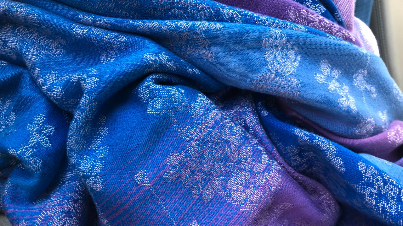 Closeup of a purple and blue baby wrap