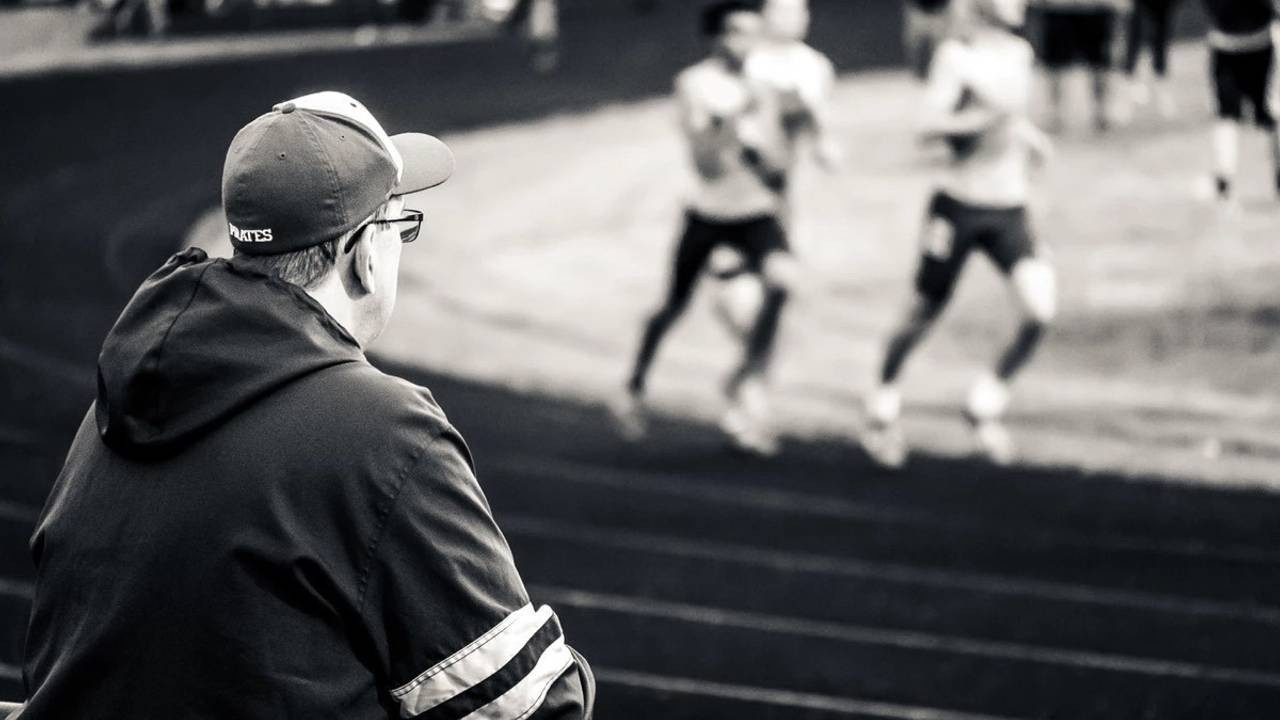 Coach watching their team