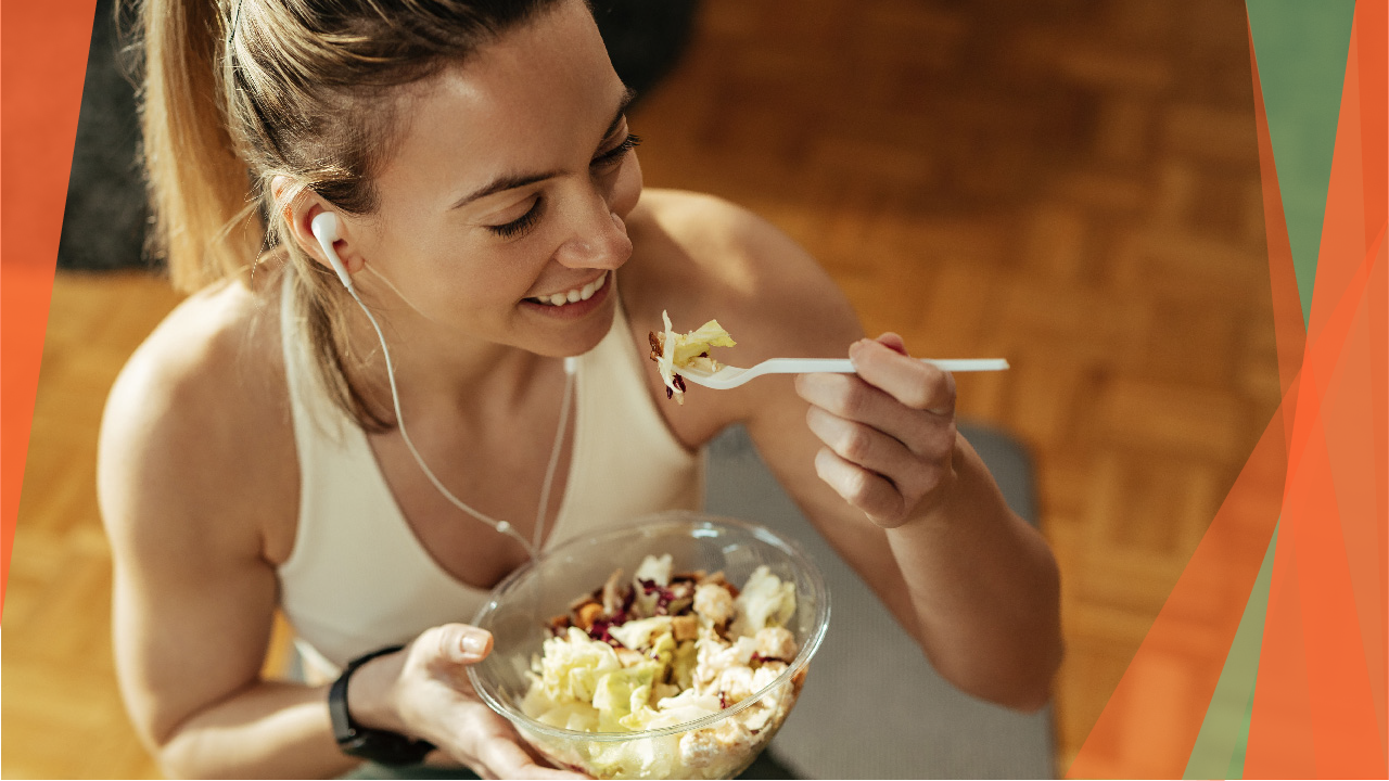 Active woman eating good food before exercise