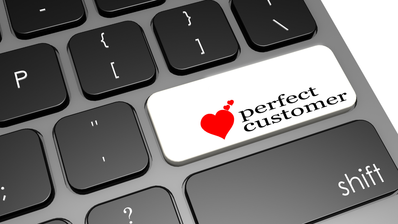 computer keyboard with white key that says perfect customer with heart next to it