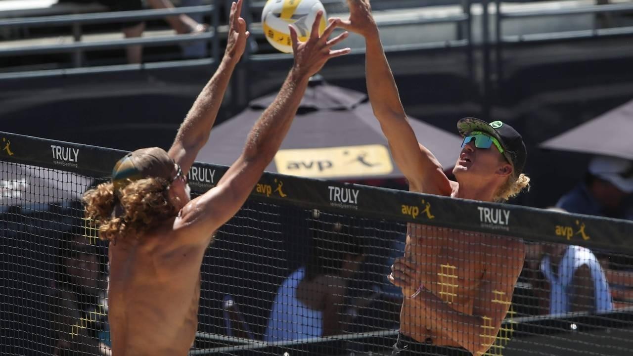 Spiking a Volleyball in Beach Volleyball