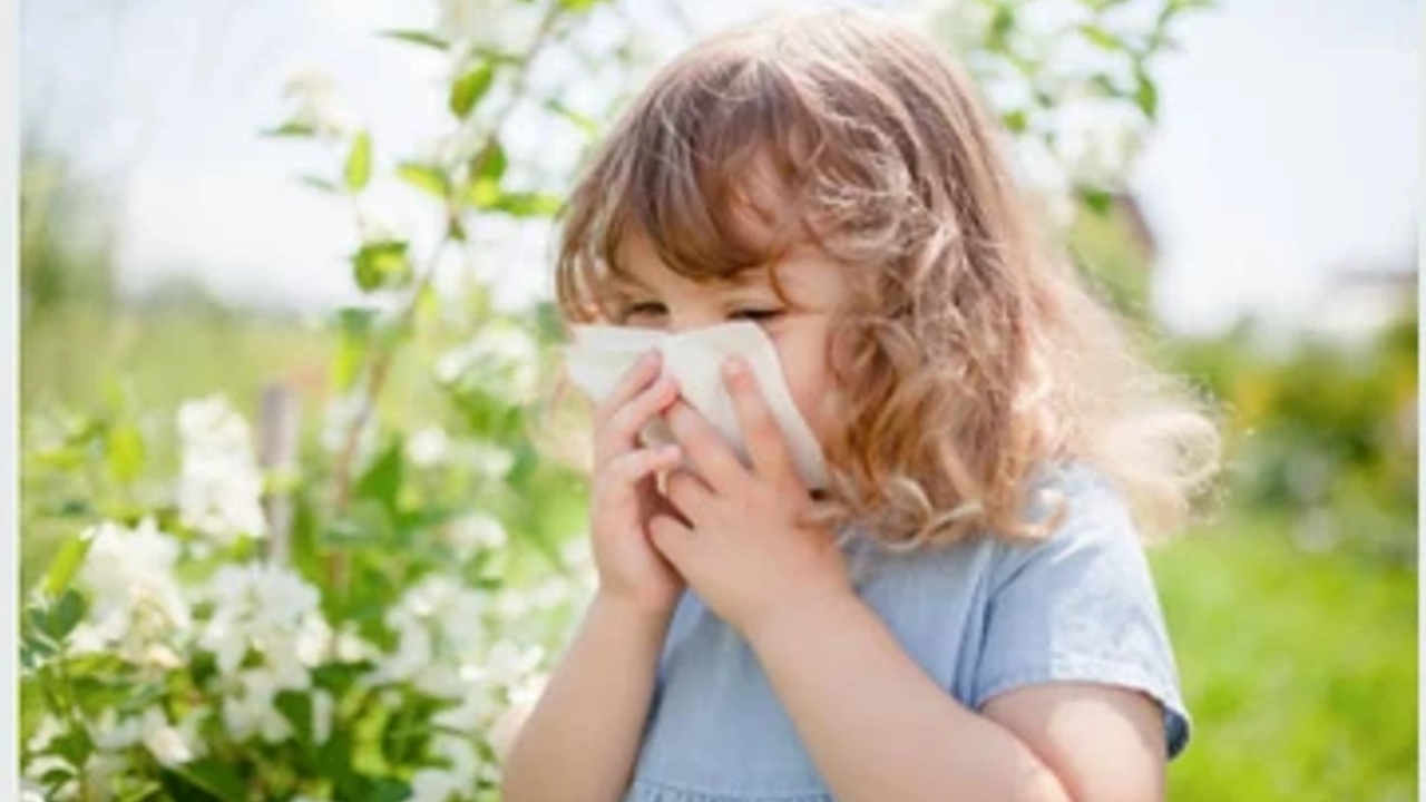 girl sneezing