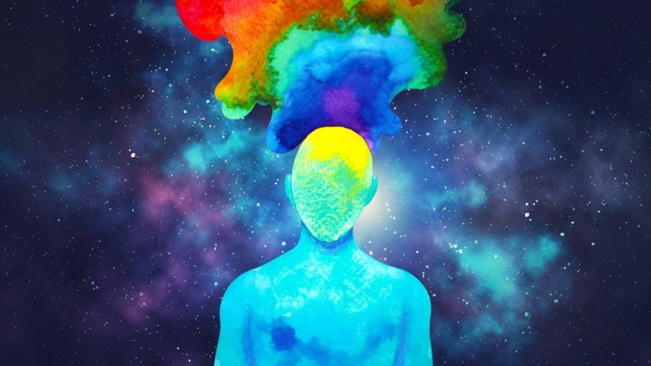 Watercolor of a person with a rainbow splash streaming from their head in front of a photo of a galaxy.