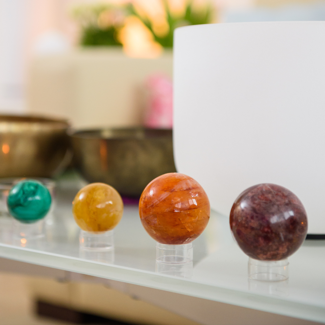 manifest your career blog post image of crystal spheres in different colors