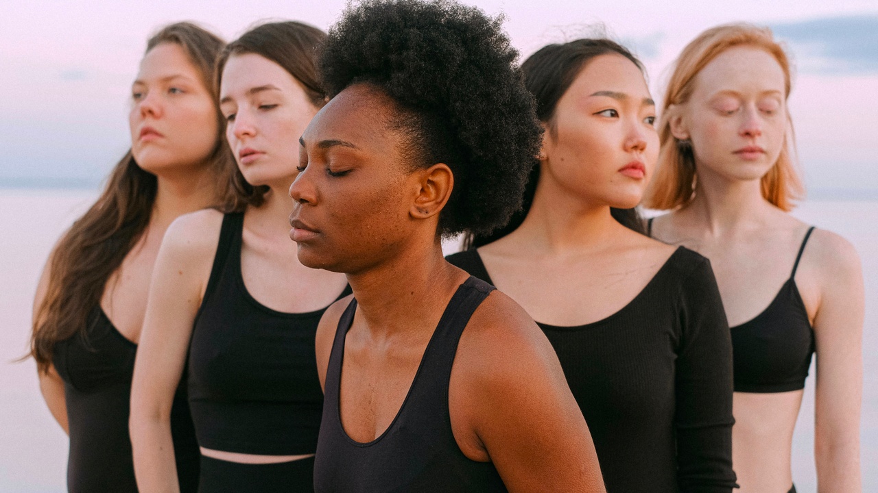 Group of 5 women of different shape, size, color, race, ethnicity