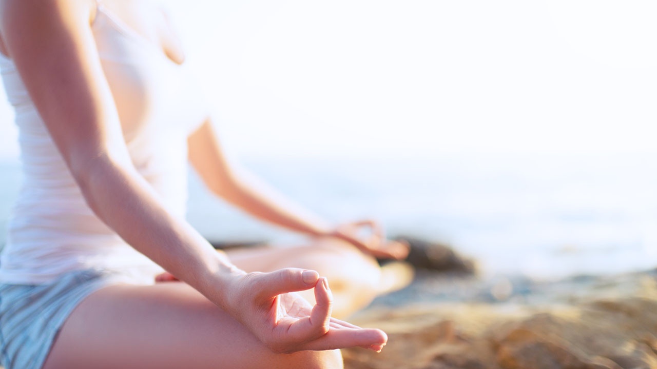 seated woman gyana mudra