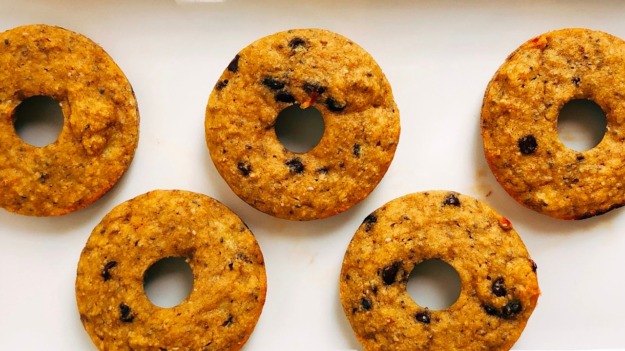 chocolate chip doughnuts on white board