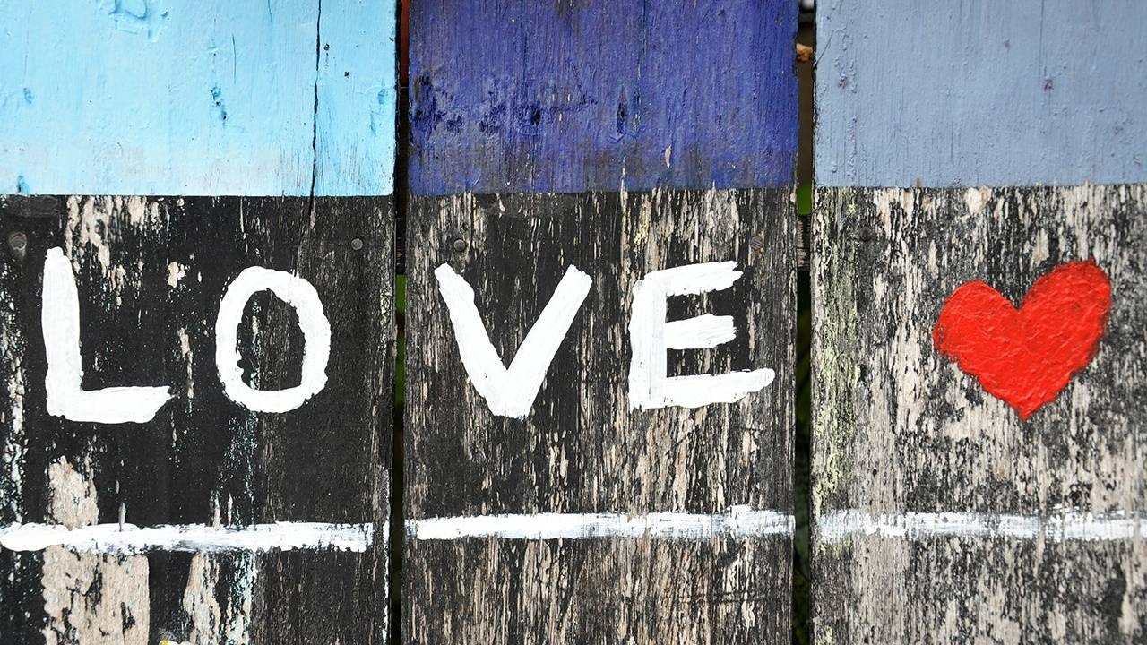 Love graphiti on wall.