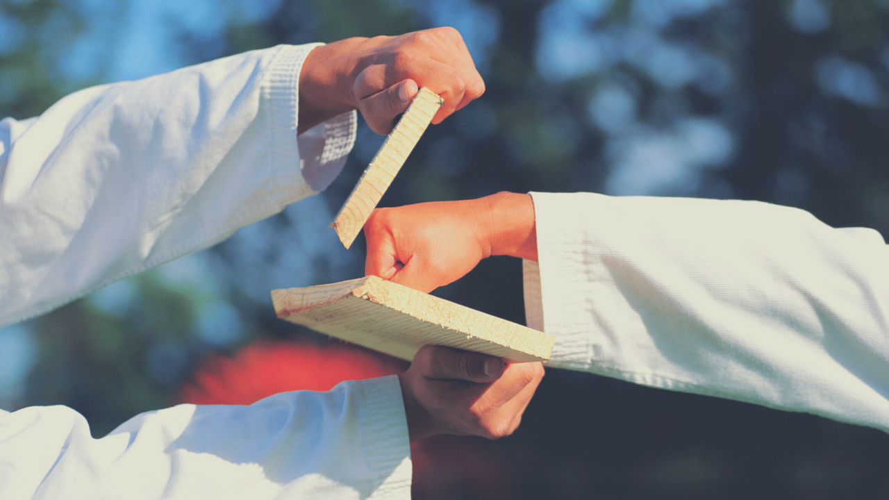 Breaking wood plank with fist