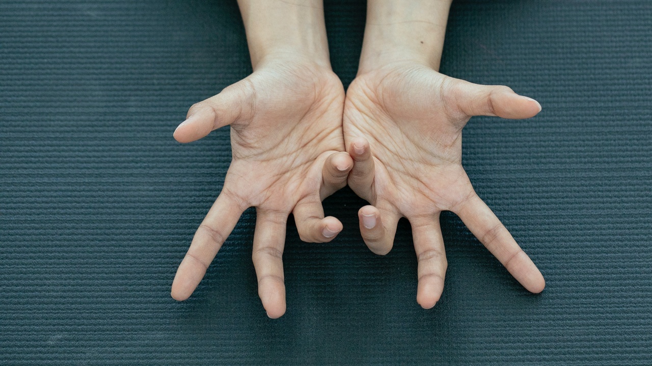 two hands with palms facing up