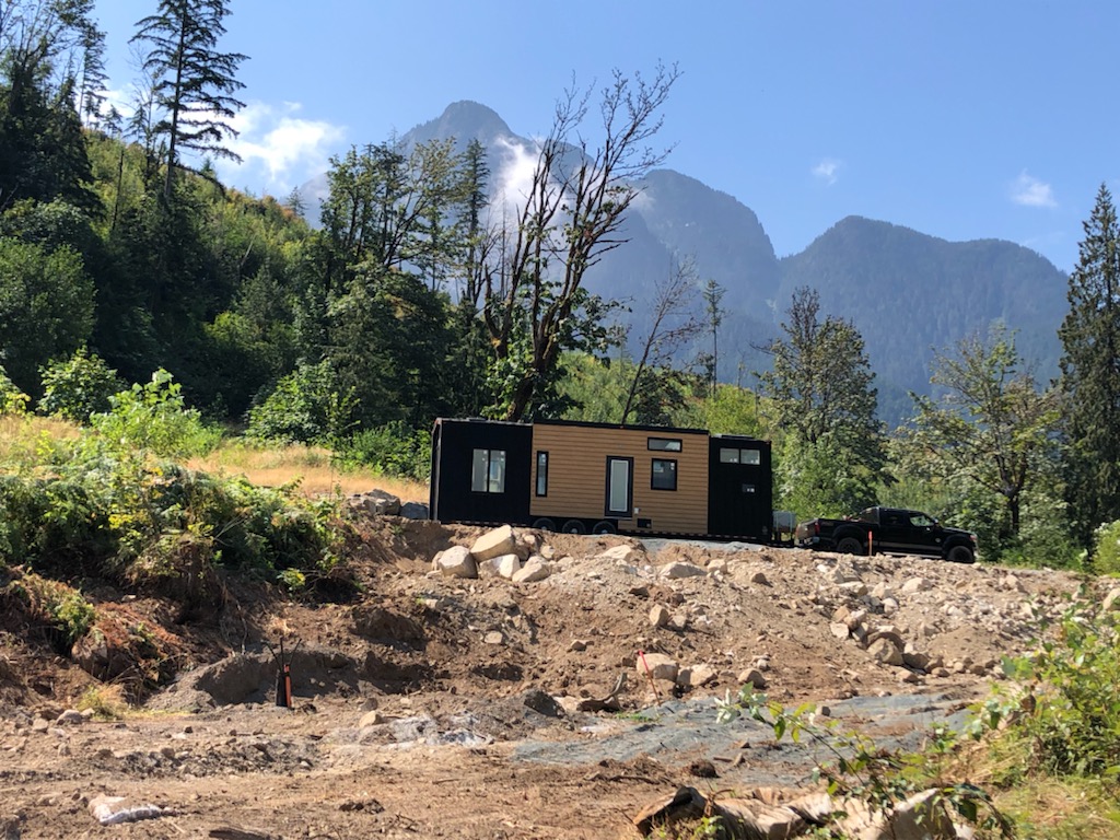 Tiny home with modern exterior being delivered to BC mountains.