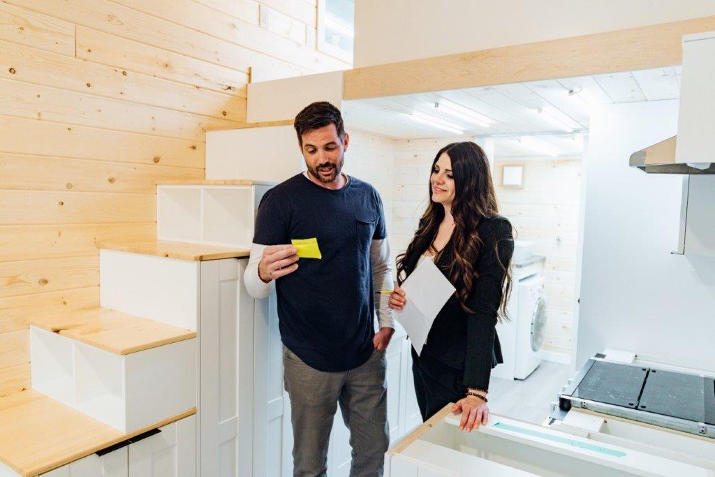 people talking in a tiny house