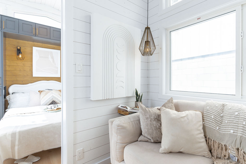 Bedroom and living area in a tiny house.