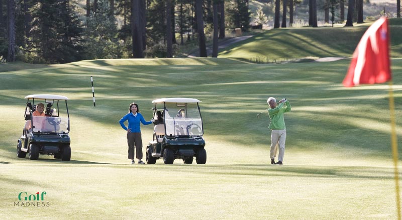 senior golfers playing golf