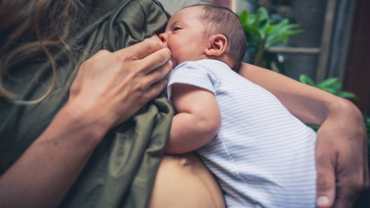 Breastfeeding Mother with newborn baby