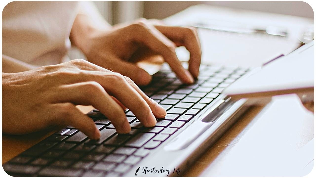 Man typing on a keyboard.