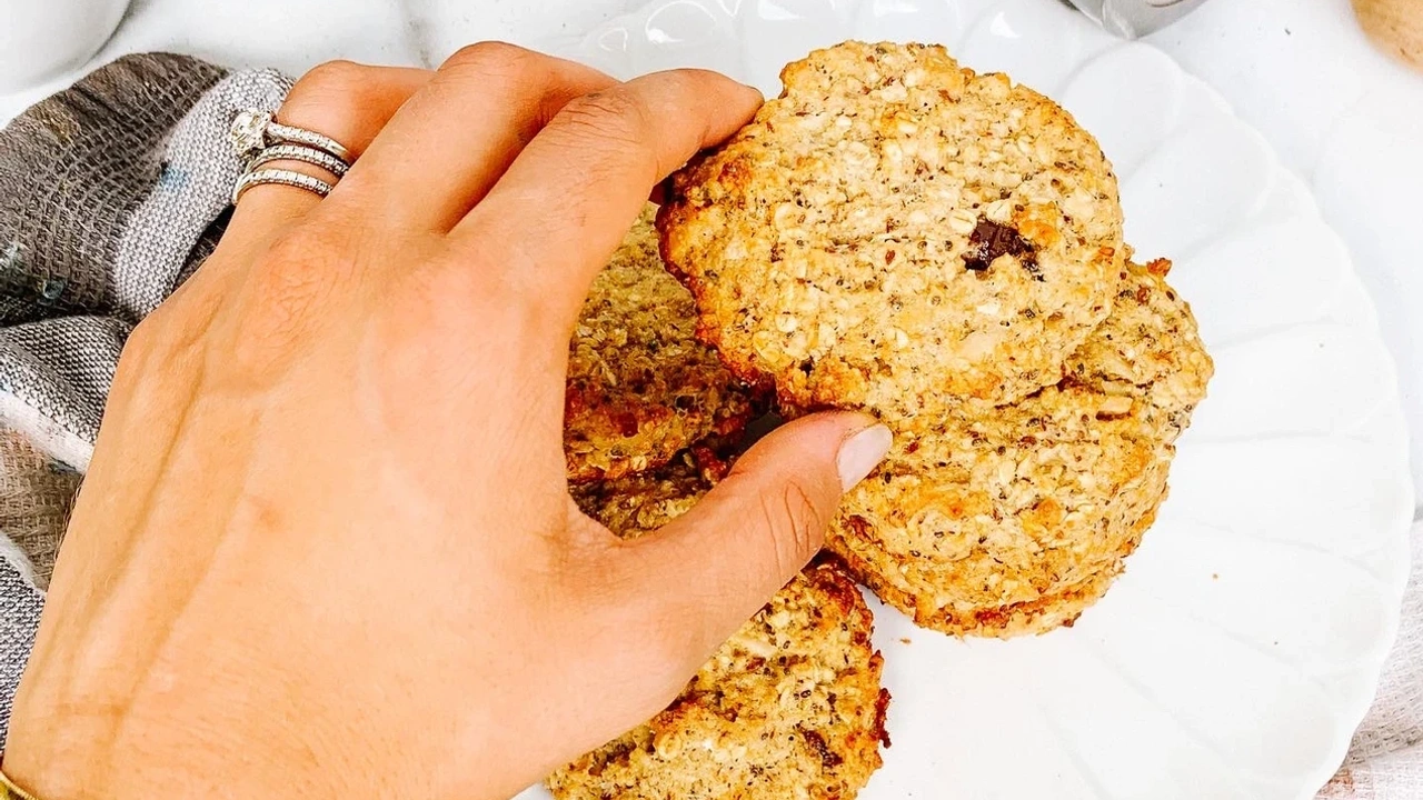 Hand reaching for cookie