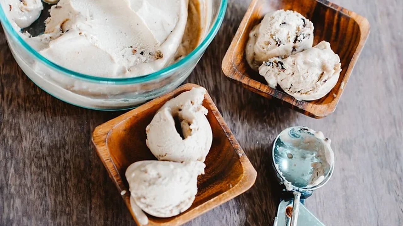 Scoops of banana ice cream in wooden bowls