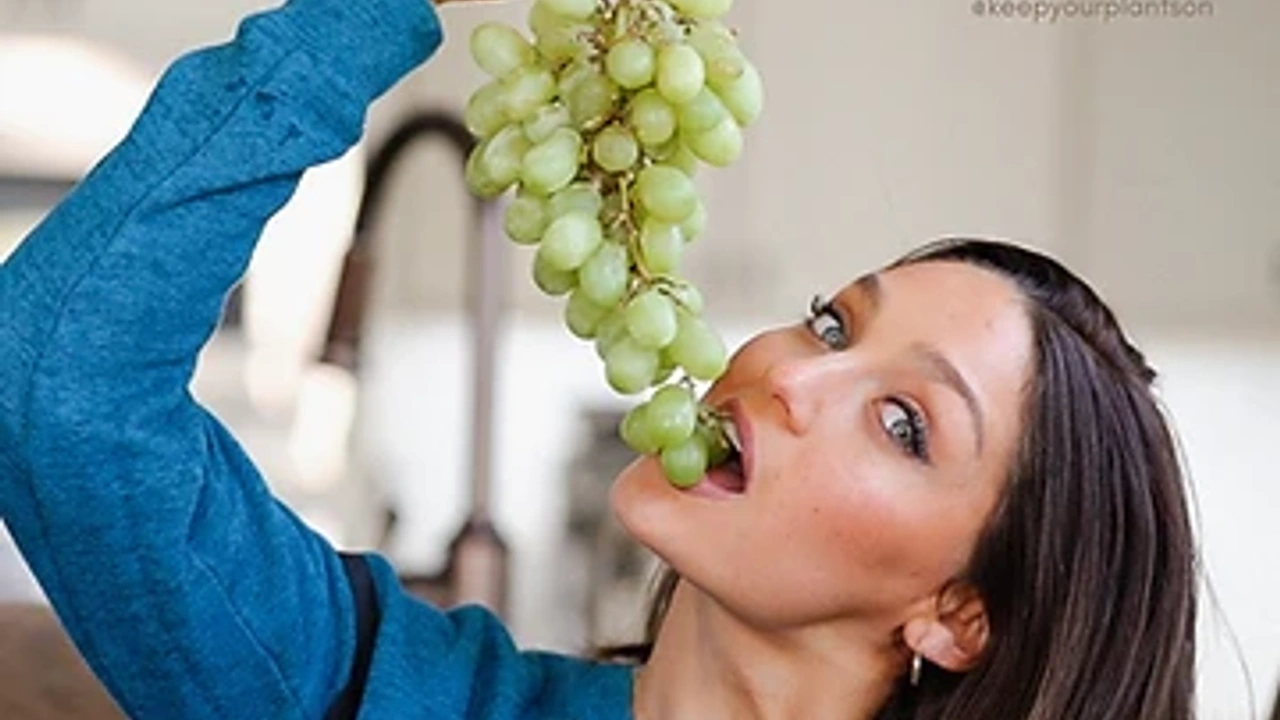 Lindsay eating green grapes