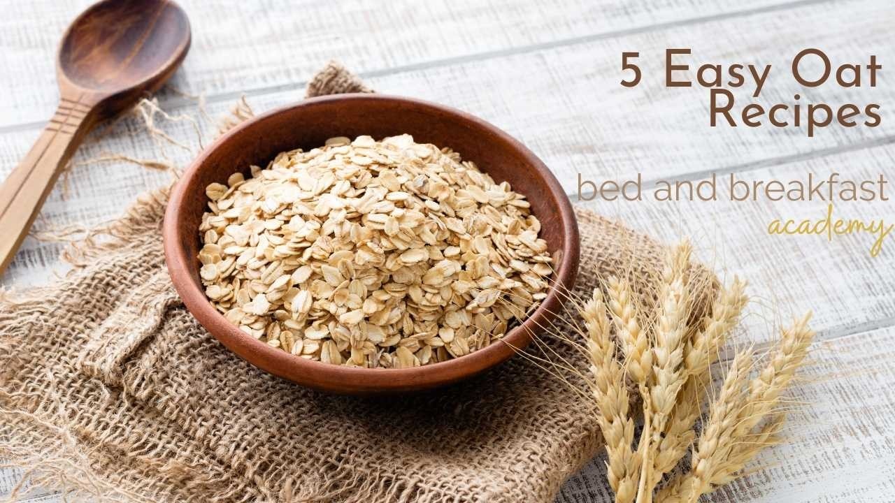 rolled oats in a brown bowl on a hessian sack and a wooden spoon