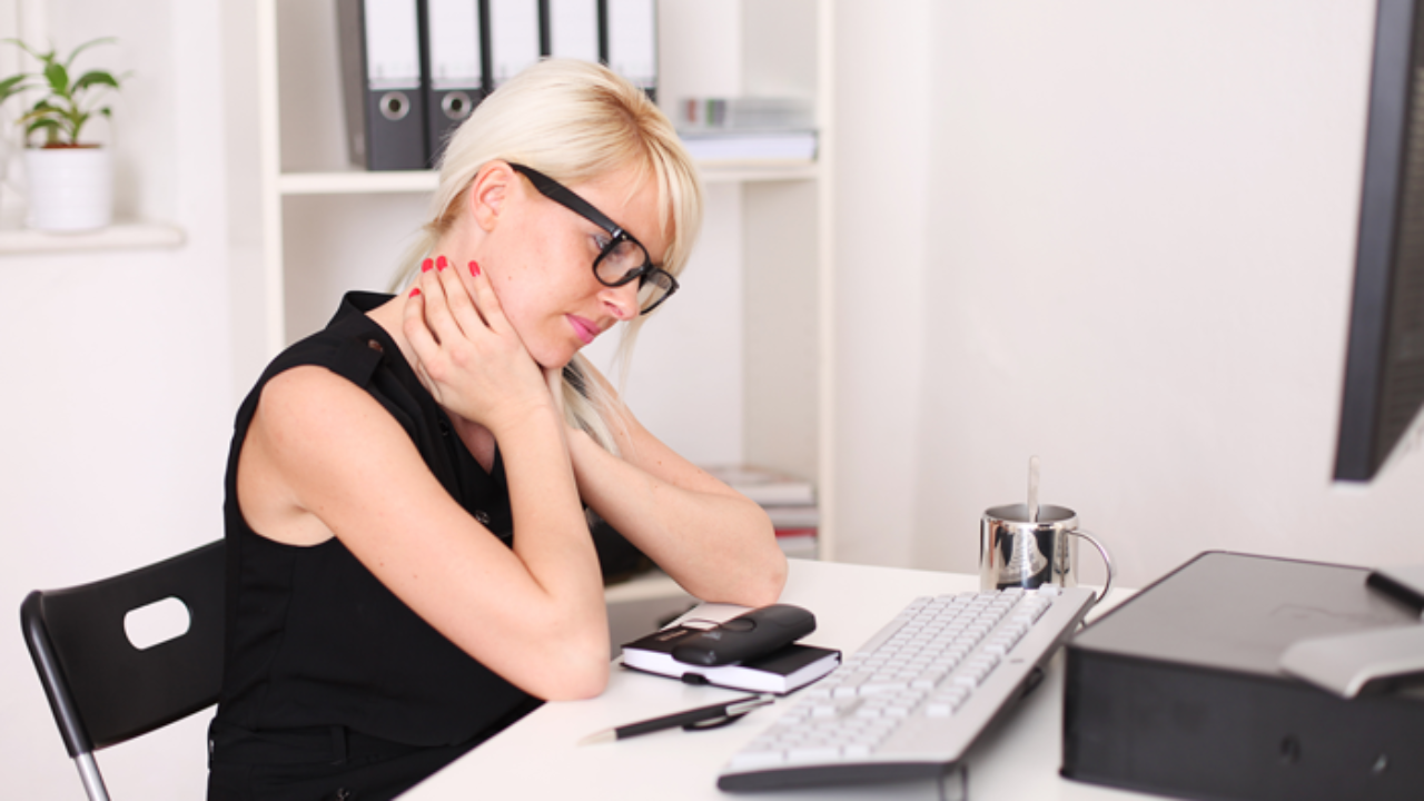 Woman sitting Too long has pain and stiffness