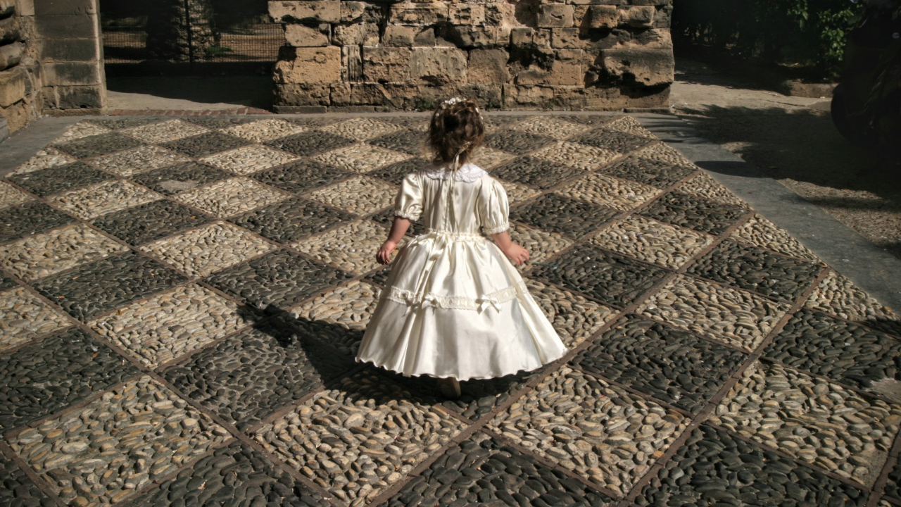 girl in dress facing out