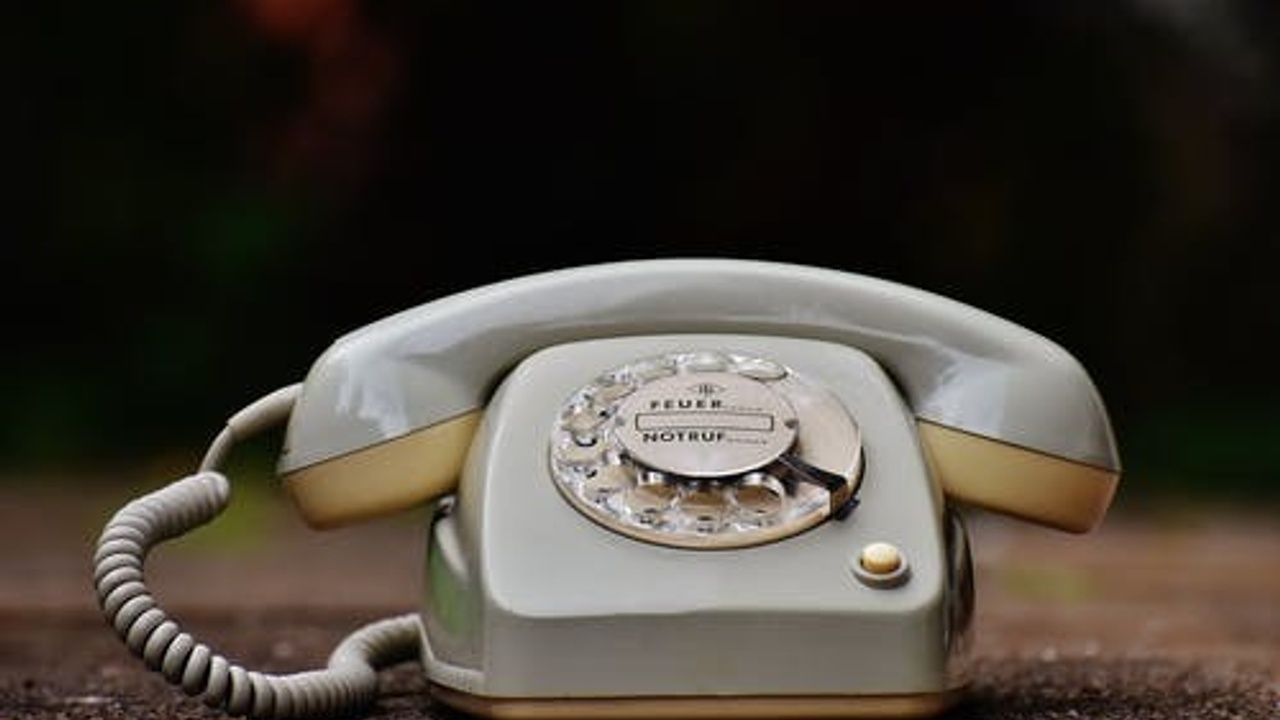 calling the number by telephone