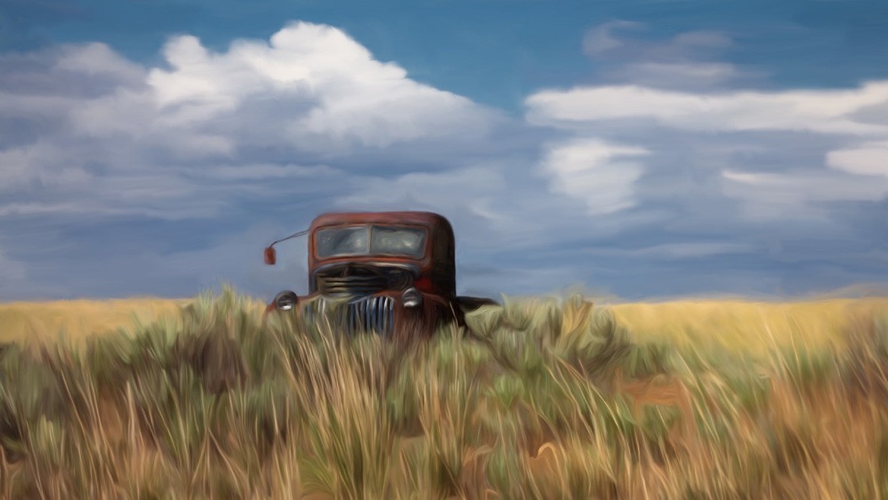 Old truck in field