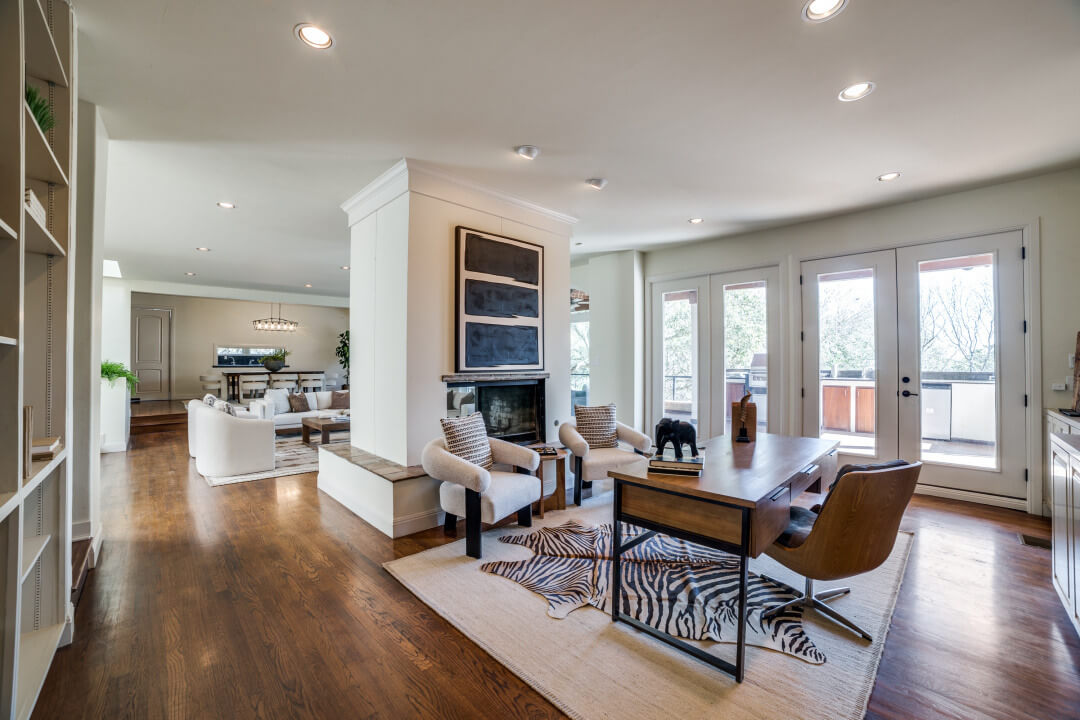 Modern Boerne estate office area staged with wooden desk and seating.