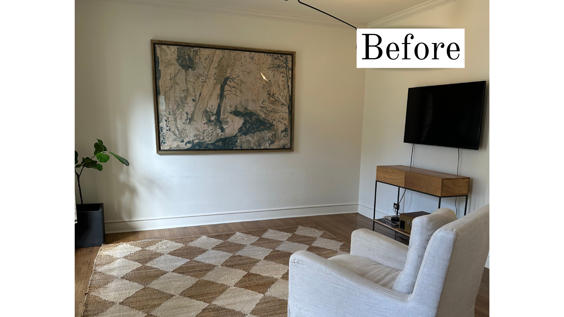 Dining room with a wooden table, white upholstered chairs, a patterned area rug, framed wall art, a wall-mounted TV, a narrow console table, and minimal decor awaiting staging enhancements.