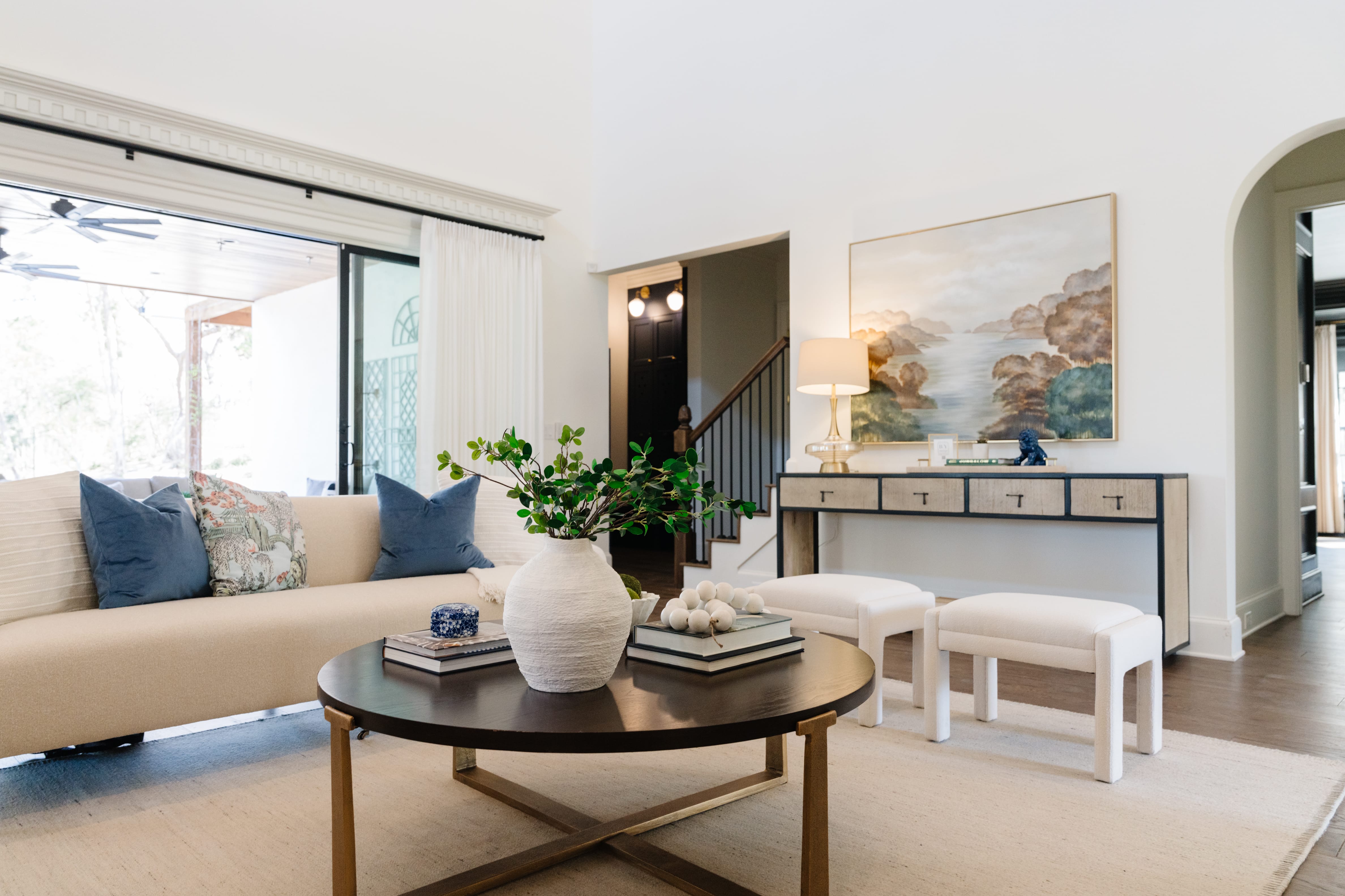 Classic, streamlined pieces with carved accents tying the rooms together.