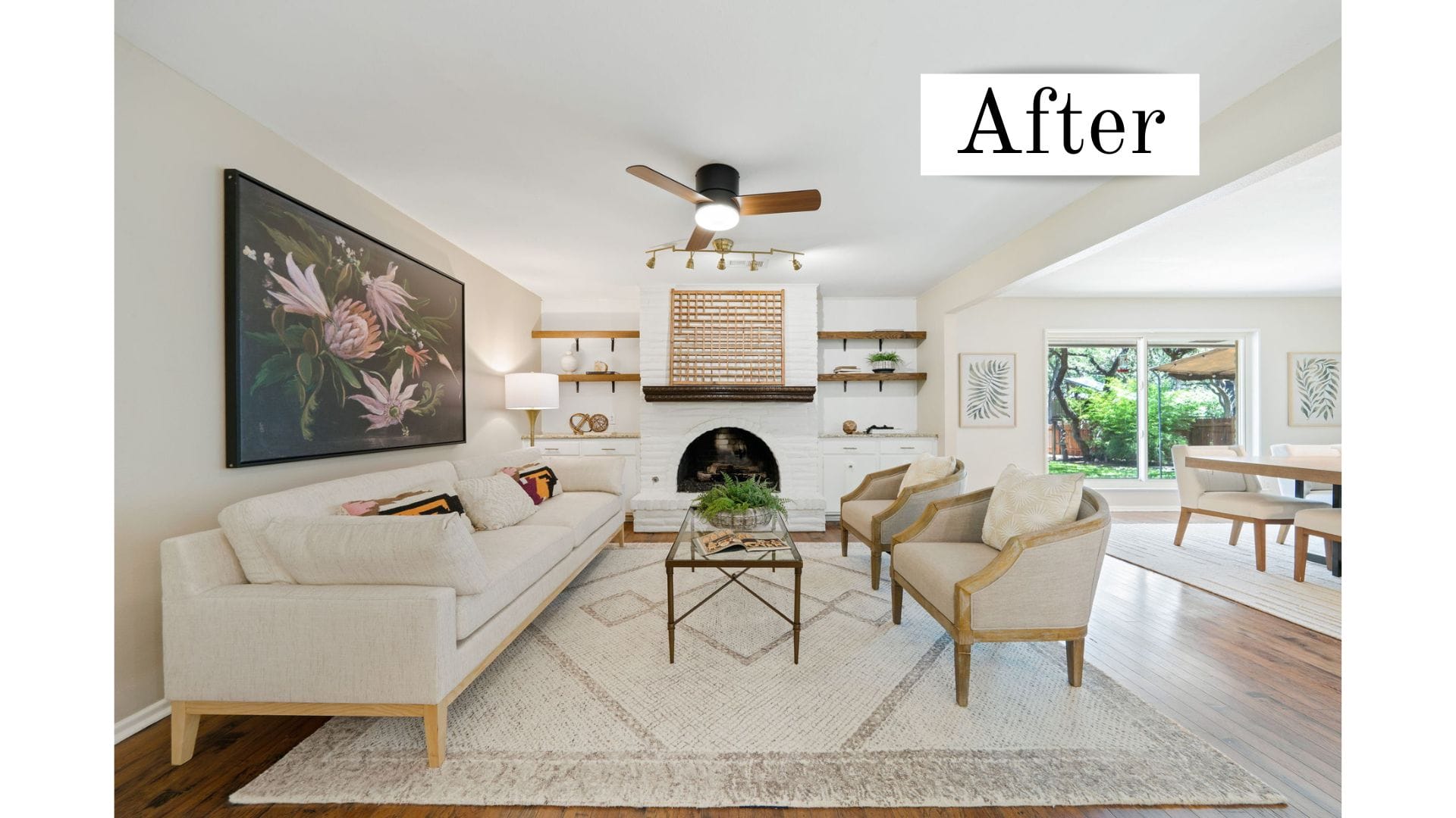 Bright, staged living room labeled &lsquo;After,&rsquo; featuring a white sofa, two upholstered armchairs, a fireplace with built-in shelves, a ceiling fan, neutral rug, and an open layout leading to a dining area with large windows.