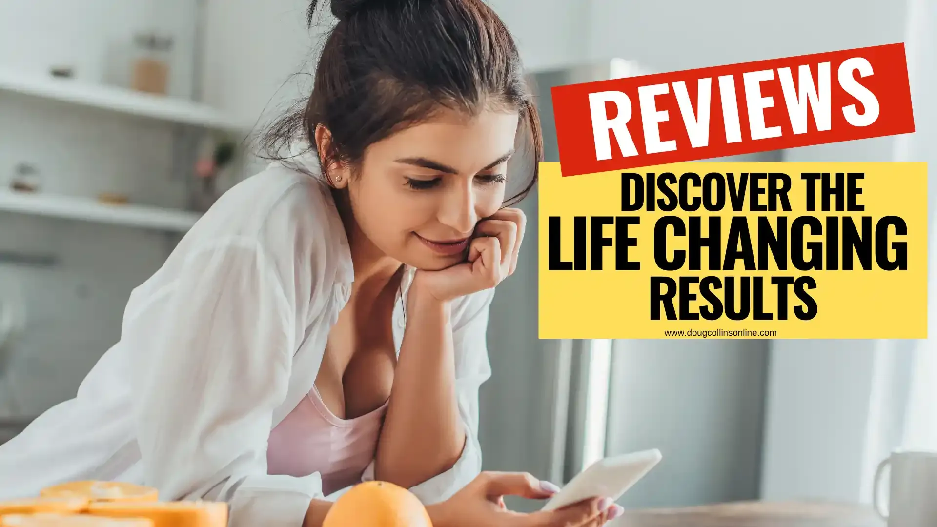 Woman leaning against a kitchen counter while reading life-changing Feel Great System reviews on her phone, with 'Reviews - Discover the Life-Changing Results' text overlay.