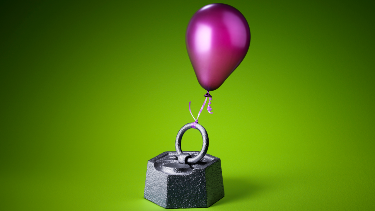 Red balloon trying to lift a heavy weight, symbolizing a founder pushing their fundraise forward while a weak metric drags momentum down.