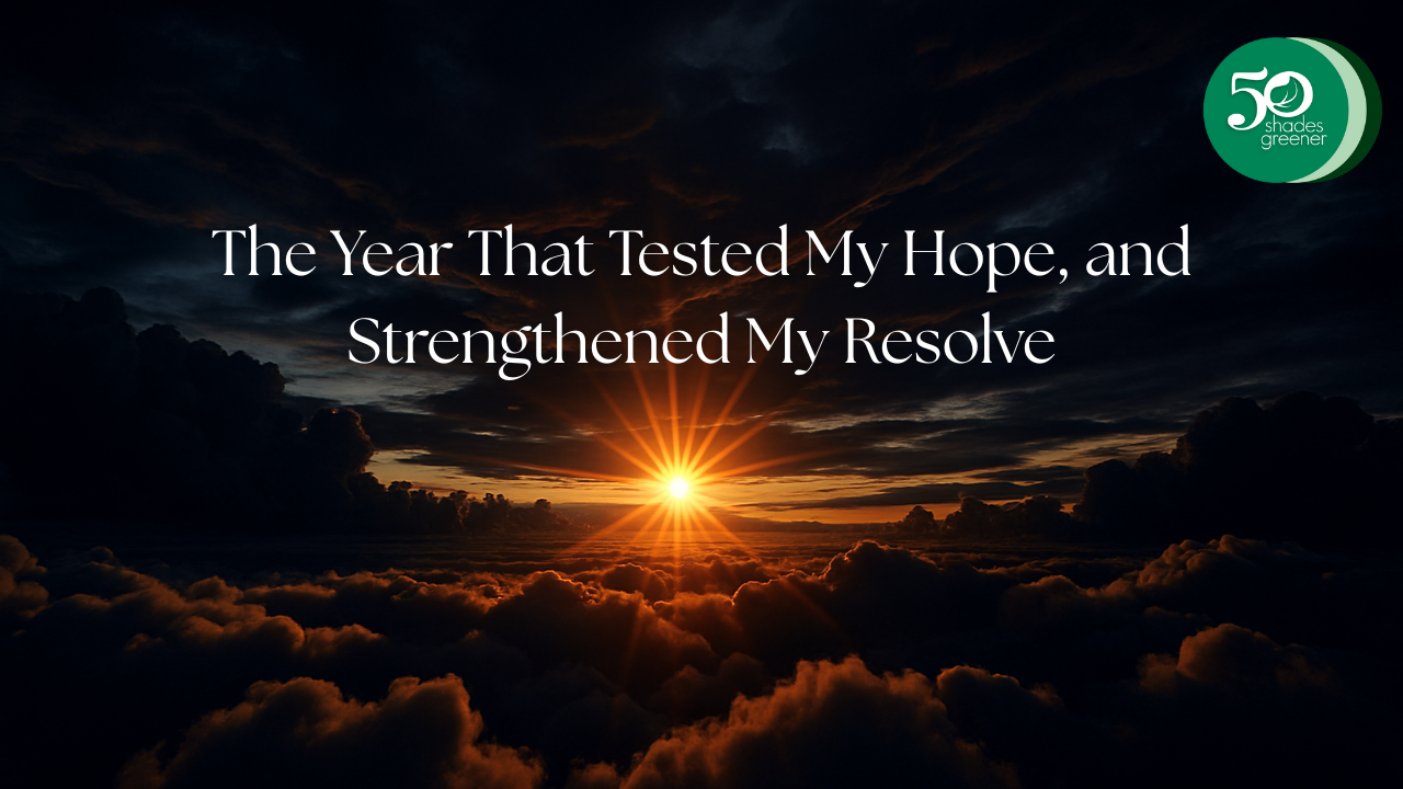 Sunrise breaking through dark storm clouds, symbolising hope emerging from a difficult year, with the Fifty Shades Greener logo and the blog title overlaid.